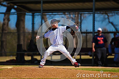 Youth baseball pitcher in wind up Stock Photo