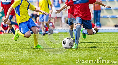 Youth football soccer match. Kids playing soccer game on sport field Stock Photo