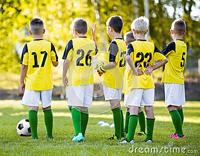 Youth football soccer training. Young boys training soccer on sports pitch Editorial Stock Photo