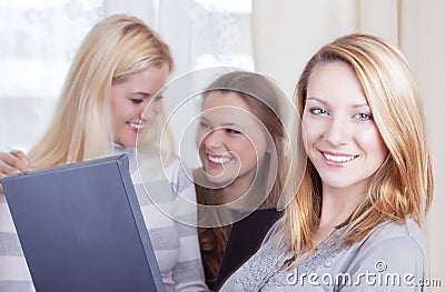 Youth Lifestyles Concepts. Three Caucasian Young Ladies With Lap Stock Photo