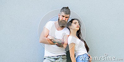 Youth stylish outfit. Couple friends hang out together grey wall background. Feel their style. Couple white shirts Stock Photo