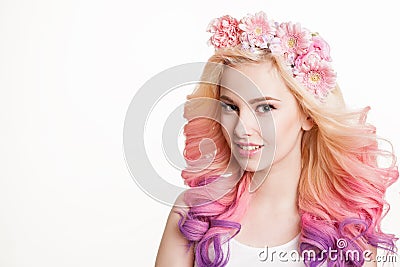 Youth women with colored hair smiling. Flowers in her . Studio, isolated, white background. Concept spring, summer. Look Stock Photo