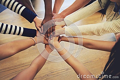 Youve got a friend in me. a group of unidentifiable friends joining their hands in solidarity. Stock Photo