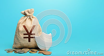 Yuan Yen money bag and protection shield. Guarantee of protection of means of savings and investments. Secured loan. Ease doing Stock Photo