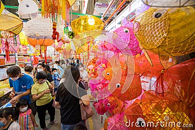 Selling traditional mid autumn lantern in wet market in Hong Kong Editorial Stock Photo