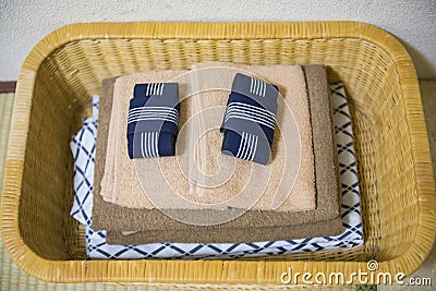 Yukata and towel in basket Stock Photo