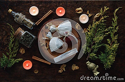 Yule winter solstice Christmas celebration themed magick spell bags filled with various herbs, spices, to put under the pillow Stock Photo