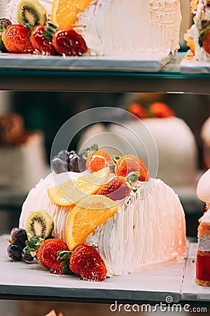 yummy assortment baked pastry in bakery. Various Different Types Of Sweet Cakes In Pastry Shop Glass Display. Good Stock Photo