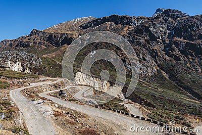 Yumthang Valley that view from high level to see the devious road line with cars in winter at Lachung. North Sikkim, India Stock Photo