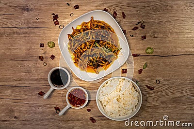 YuXiang chicken, traditional chinese dish served with white rice and soy sauce Stock Photo