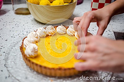 Yuzu tart and meringues Stock Photo
