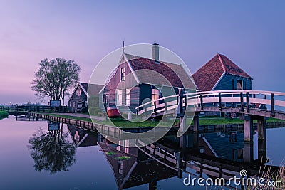 Zaanse Schans Netherlands a Dutch windmill village during sunset whit wooden house holland Stock Photo