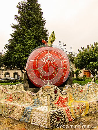 ZACATLÃN OF APPLES, PUEBLA, MEXICO - OCTOBER 01, 2017: Monumental red sphere in the center of a magical town. Christmas. Editorial Stock Photo