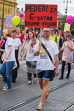 15th Zagreb pride. LGBTIQ activist holding banner. Editorial Stock Photo