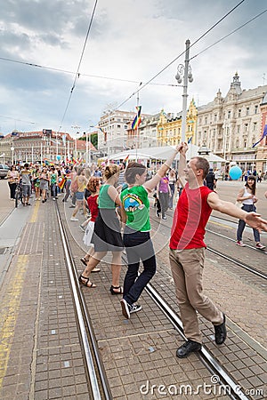 15th Zagreb pride. LGBTIQ activists dancing at the main square. Editorial Stock Photo