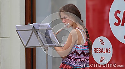 Zagreb Street Musician / Young Woman / Flutist Editorial Stock Photo