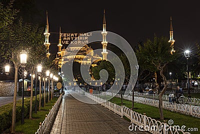 `Zakat increases and protects wealth` lettering hanging on Blue Mosque`s mahya in Istanbul,Turkey. Stock Photo