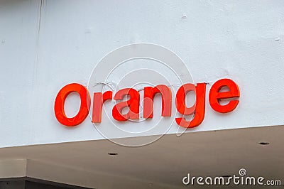 Logo and sign of Orange mobile company. Editorial Stock Photo