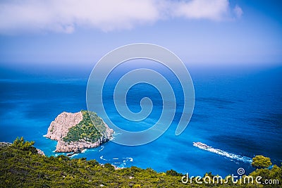 Zakynthos fantastic west coastal view with white cliff. White tourist ship sailing full speed on open azure sea water Stock Photo