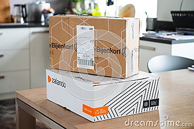 Zalando and De Bijenkorf online package delivery, unboxing package, online shopping, fashi Editorial Stock Photo