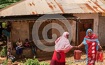Zanzibar, Tanzania - JANUARY 2020: Black African People in their Usual Lifestyle on Streets of Zanzibar Village Editorial Stock Photo
