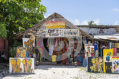 Front view of African shop clothes and souvenirs for tourists on the beach in Zanzibar island, Tanzania, east Africa Editorial Stock Photo