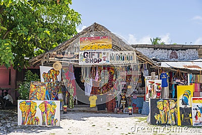 Front view of African shop clothes and souvenirs for tourists on the beach in Zanzibar island, Tanzania, east Africa Editorial Stock Photo