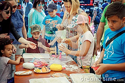Outdoors children activity on charity family festival Editorial Stock Photo