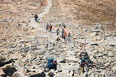 Hikers travel in the Babia Gora Mountain with a backpack Editorial Stock Photo