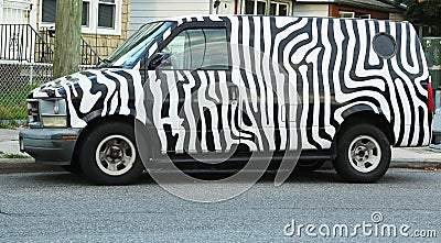 Zebra painted GMC Safari van Editorial Stock Photo