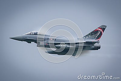 Austrian Air Force Eurofighter military aircraft on high speed with lots of condensation Editorial Stock Photo