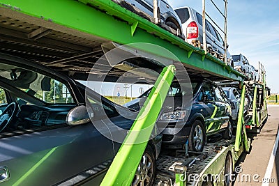 ZELVA, BELARUS - SEPTEMBER 2019: Car carrier truck loaded with many cars in the parking lot Editorial Stock Photo