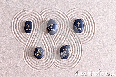 Zen art with stones on golden sand Stock Photo