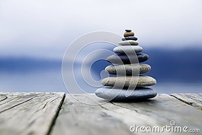 Zen Balancing Pebbles Misty Lake Concept Stock Photo