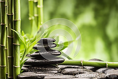 Zen basalt stones and bamboo Stock Photo