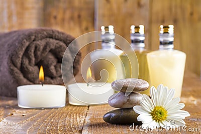 Zen basalt stones and spa oil with candles Stock Photo