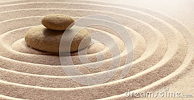 Zen garden meditation stone background with stones and lines in sand for relaxation balance and harmony spirituality or spa Stock Photo