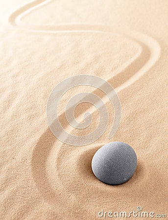 Zen meditation stone to focus and concentrate for a quiet peace of mind Stock Photo