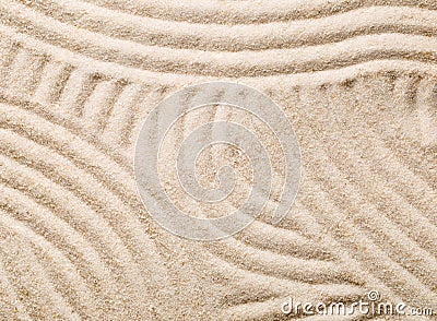 Zen sand and stone garden with raked lines, curves and circles. Stock Photo