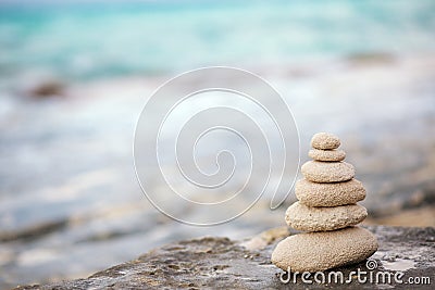 Zen stones, background the ocean for the perfect meditation Stock Photo