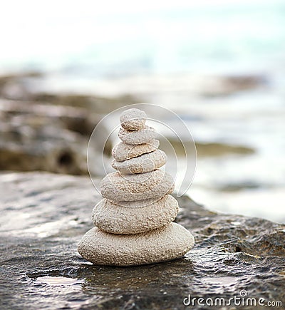 Zen stones, background ocean, see, place for the perfect meditation Stock Photo