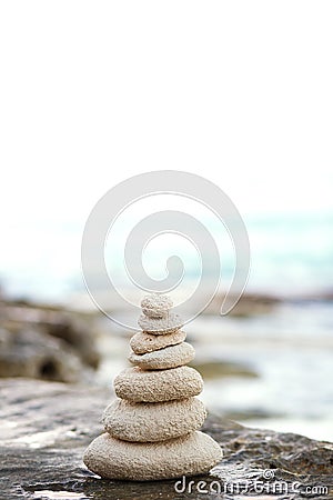 Zen stones, background ocean, see, place for the perfect meditation Stock Photo