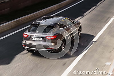 zenith view of Maserati levante premium SUV car driving on highway road. Rear aerial view Editorial Stock Photo