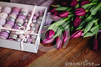 Zephyr, macaroons and tulips. Stock Photo