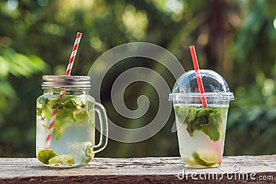 Zero waste concept Use a plastic glass or mason jar. Zero waste, green and conscious lifestyle concept. Reusable on the go drink Stock Photo