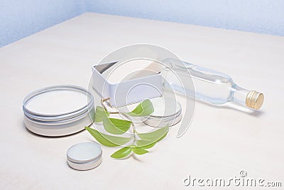Zero waste options for your bathroom. Reusable, repurposed glass and tin cosmetics containers. Stock Photo