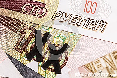 2 zeros are crossed out on one hundred ruble bill. Concept on the topic of devaluation of the Russian currency Stock Photo