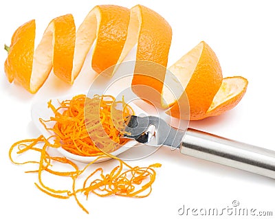 Zest of orange fruit and zester Stock Photo