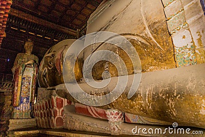 ZHANGYE, CHINA - AUGUST 23, 2018: Reclining Buddha in Giant Buddha Dafo Temple in Zhangye, Gansu Province, Chi Stock Photo