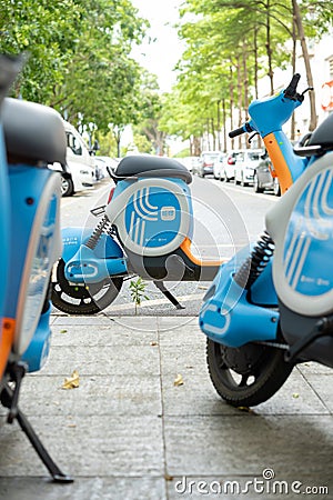 Hellomoto shared electric scooters in the outdoor Editorial Stock Photo